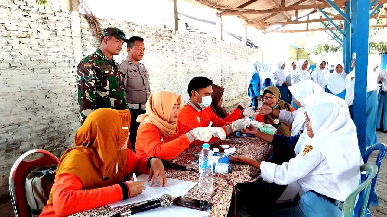 Sinergitas Polres Probolinggo Kota Bersama Kodim 0820 Salurkan Vitamin Tekan Stunting