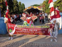 Rayakan HUT RI Ke 79, Warga Dewi Ngubalan Ramai Ikuti Jalan Sehat Karnaval