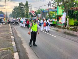Pengaturan Lalu Lintas Pagi di Laksanakan di Depan SMPN 1 Babat Guna Untuk Menyeberangkan Anak-anak Sekolah Serta Masyarakat