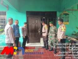 Anggota Polsek Babat Melaksanakan Pengamanan Kotak Suara di Gudang PPK Kecamatan Babat