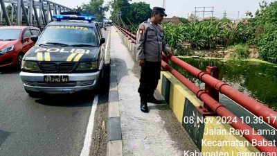 Intensitas Curah Hujan Yang Tinggi Polsek Babat Pantau Debit Air Bengawan Solo