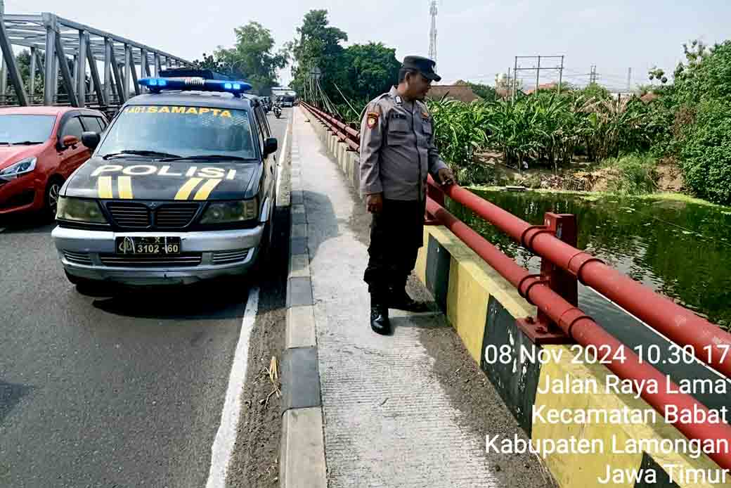 Intensitas Curah Hujan Yang Tinggi Polsek Babat Pantau Debit Air Bengawan Solo