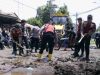 Polres Situbondo Gelar Bakti Sosial Bersihkan Material Pasca Banjir di Kecamatan Kendit