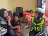 Kesigapan Polisi di Magetan Temukan Anak Terpisah dari Orang Tuanya di WisataTelaga Sarangan
