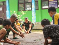 Satgas TMMD ke-12 Ajak Anak-Anak Bermain Permainan Tradisional