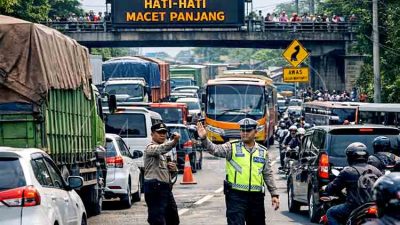 Polsek Babat Atur Lalu Lintas, Kemacetan Perbatasan Lamongan–Tuban MDN