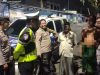 Patroli Dialogis Polres Pelabuhan Tanjungperak Imbau Warga di Pesisir Surabaya Antisipasi Banjir Rob
