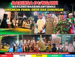 Babinsa 01/Ngawi Bersama Bhabinkamtibmas Amankan Pawai Obor dan Gunungan