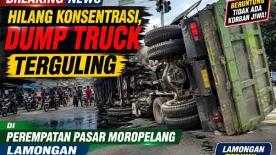 Hilang Konsentrasi, Dump Truck Terguling di Perempatan Pasar Moropelang Lamongan